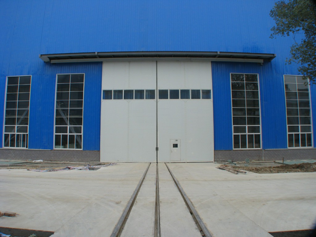 工业提升门彩钢板保温车间门电动垂直提升门厂房车间门厂家直销-阿里巴巴
